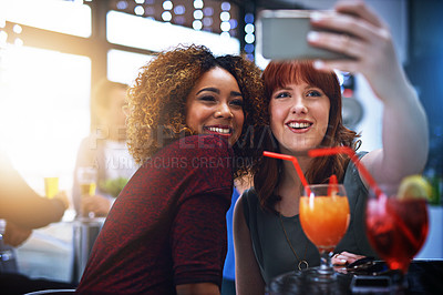 Buy stock photo Friends, smartphone selfie and smile with drinks at party or year end event, night out and celebration together. Women, happy and celebrate friendship with photograph, love and support with cocktail