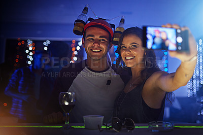 Buy stock photo Friends, night club and smile for phone selfie, celebration or social event at the night party. Happy man and woman smiling for photo moments celebrating fun vibes together with mobile smartphone