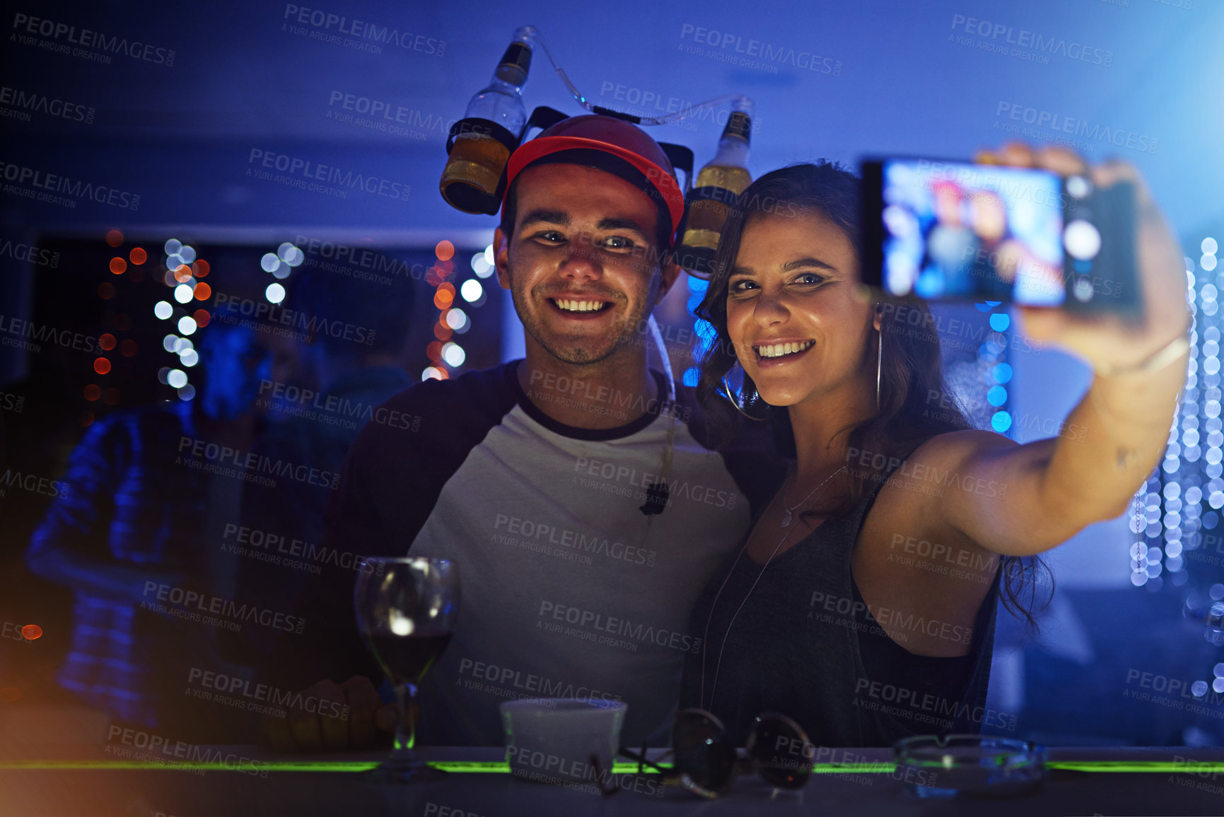 Buy stock photo Friends, night club and smile for phone selfie, celebration or social event at the night party. Happy man and woman smiling for photo moments celebrating fun vibes together with mobile smartphone