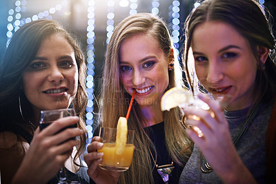 Buy stock photo Portrait of a group of friends having drinks together at a party