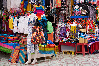 Buy stock photo Shot of a market stall selling clothes