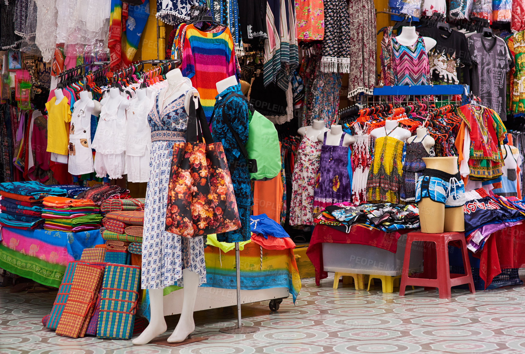 Buy stock photo Shot of a market stall selling clothes