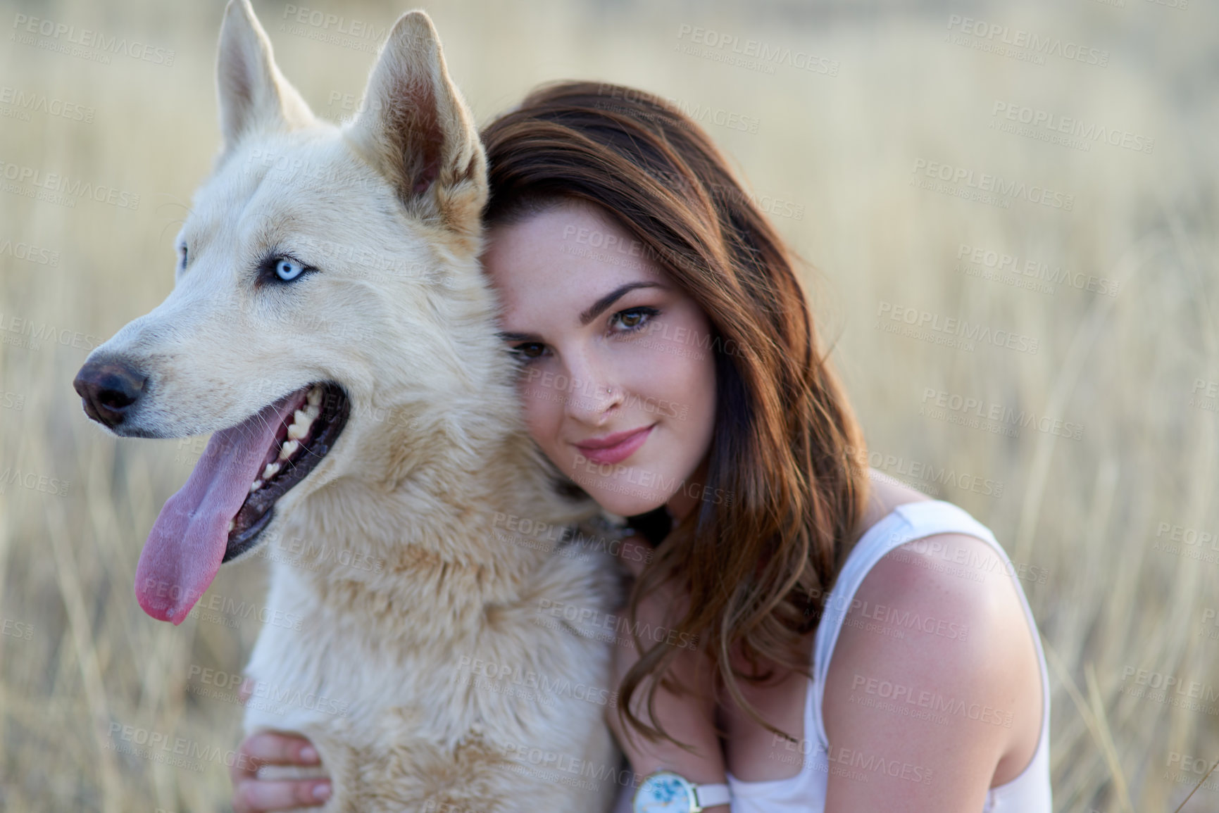 Buy stock photo Love, portrait or woman hug dog in field for travel, adventure or behaviour training while bonding in nature together. Puppy, face or girl with calm pet Husky in a park with care, support and trust
