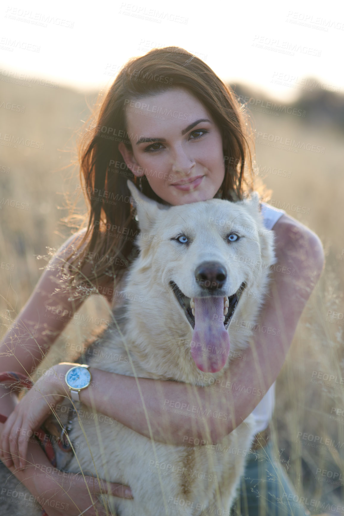 Buy stock photo Woman, dog and hug in portrait, field and care with bonding, connection and adventure in summer. Girl, person and relax outdoor with husky, pet animal and embrace with trust on holiday in countryside