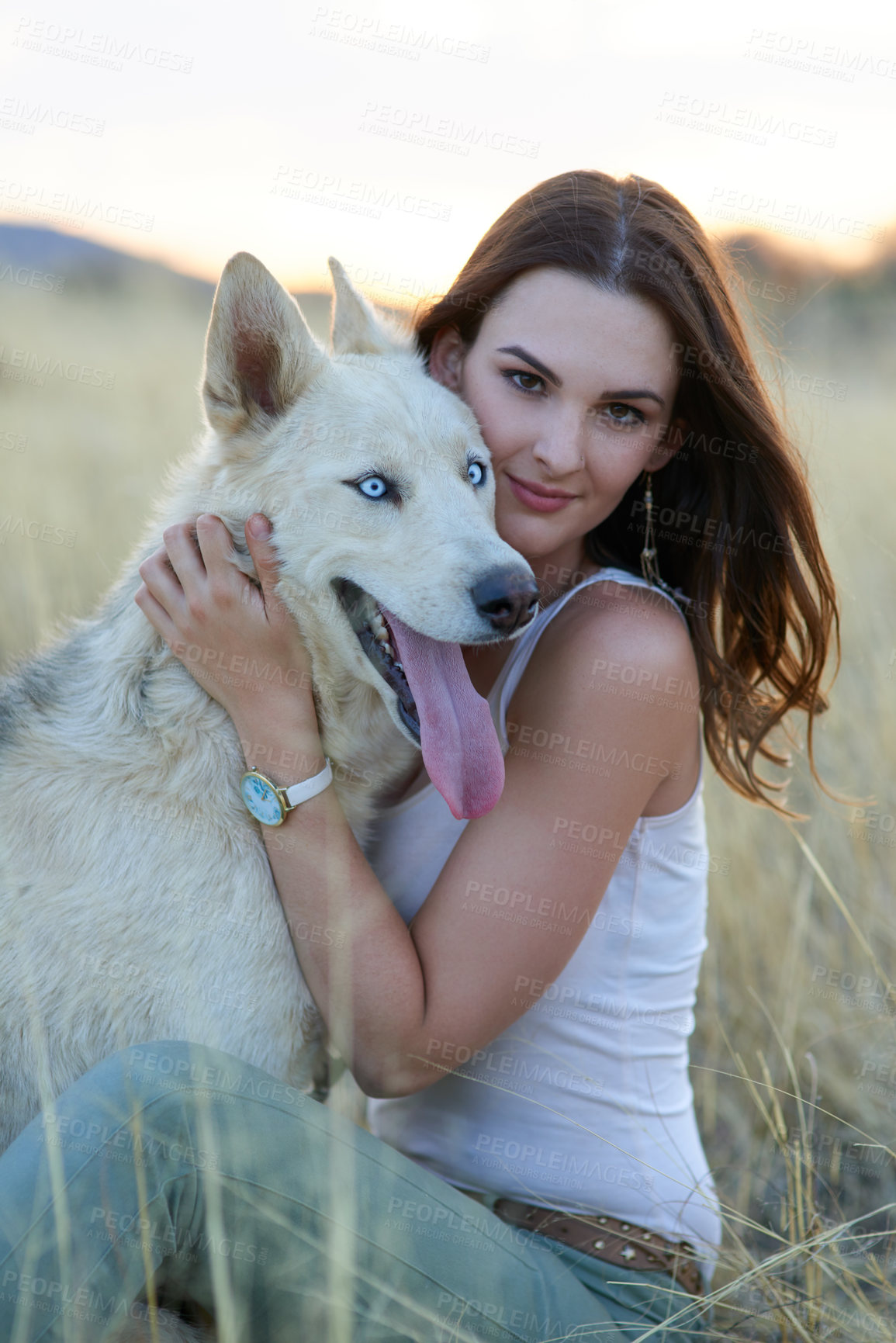 Buy stock photo Woman, dog and embrace in portrait, field and care with bonding, connection and adventure in summer. Girl, person and relax outdoor with husky, pet animal and hug with trust on holiday in countryside