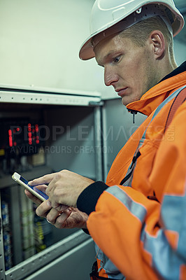 Buy stock photo Power, phone and man in electricity maintenance, engineering and industrial grid inspection. Renewable energy, production and technician typing on smartphone at electrical box for quality assurance