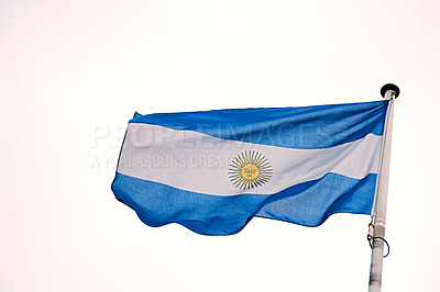 Buy stock photo Wind, sky and flag of Argentina on pole for government, country or national banner of identity. Material, color and state fabric with wave for republic representation, democracy or symbol of politics