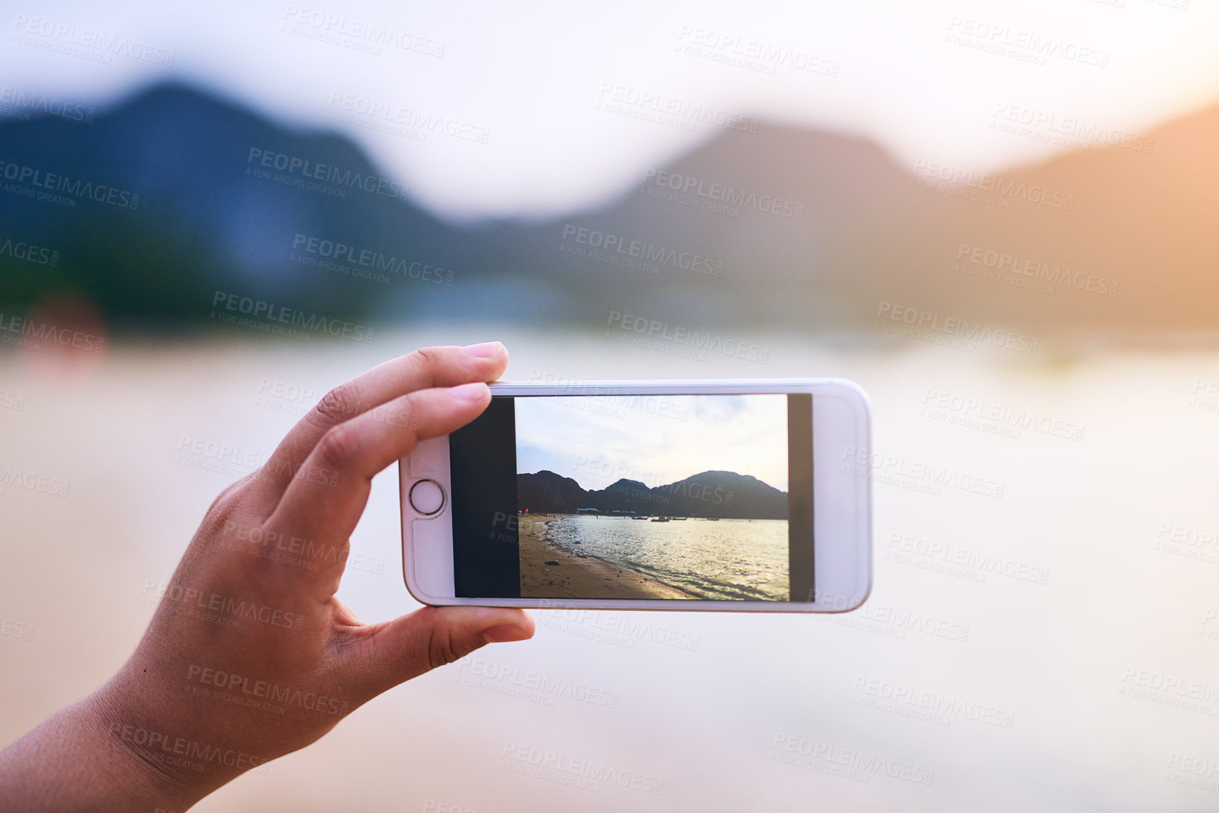 Buy stock photo Beach, hand and person take picture with phone for vacation, holiday or travel. Closeup, mobile screen and photography of ocean for view of sea water on journey, summer adventure and tourism in Bali