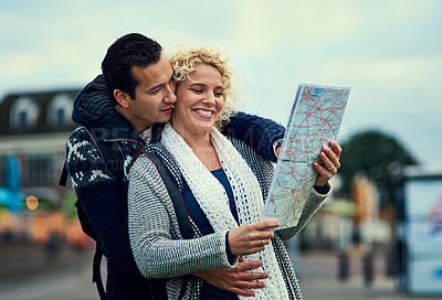 Buy stock photo Travel, city and couple with map for location, urban adventure and international holiday for honeymoon. Man, woman and reading paper gps with direction search and love for vacation together in Berlin