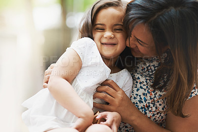 Buy stock photo Love, girl child and mother hug with smile for development, care and playing together on weekend. Happy, kid and female parent embrace with laugh for relationship, bonding and kindness or adoration