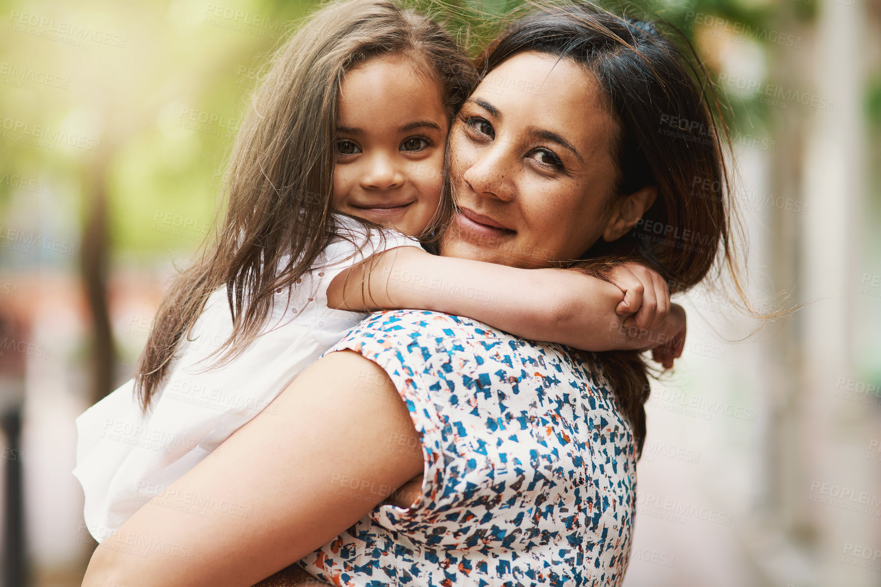 Buy stock photo Shot of a young mother bonding with her daughter