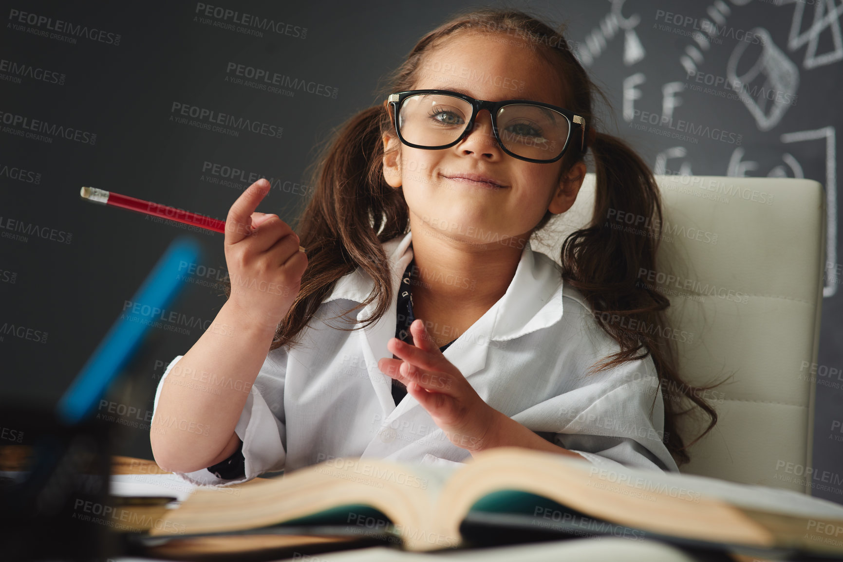 Buy stock photo Portrait, preschooler and classroom with books, pencil and learning in education for childhood development. Girl, child and tuition for growth, reading and chalkboard for knowledge, assessment as kid