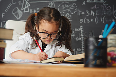 Buy stock photo Student, writing and girl in classroom, learning and knowledge with science, pencil and intelligent. Person, kid and child development with ideas, education and glasses with books, school and math