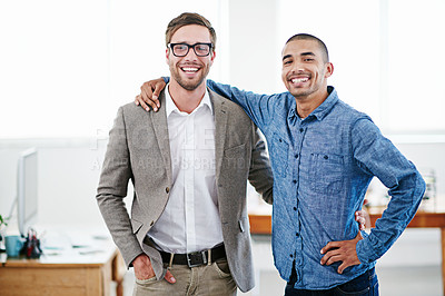 Buy stock photo Shot of two businessmen standing together in an office