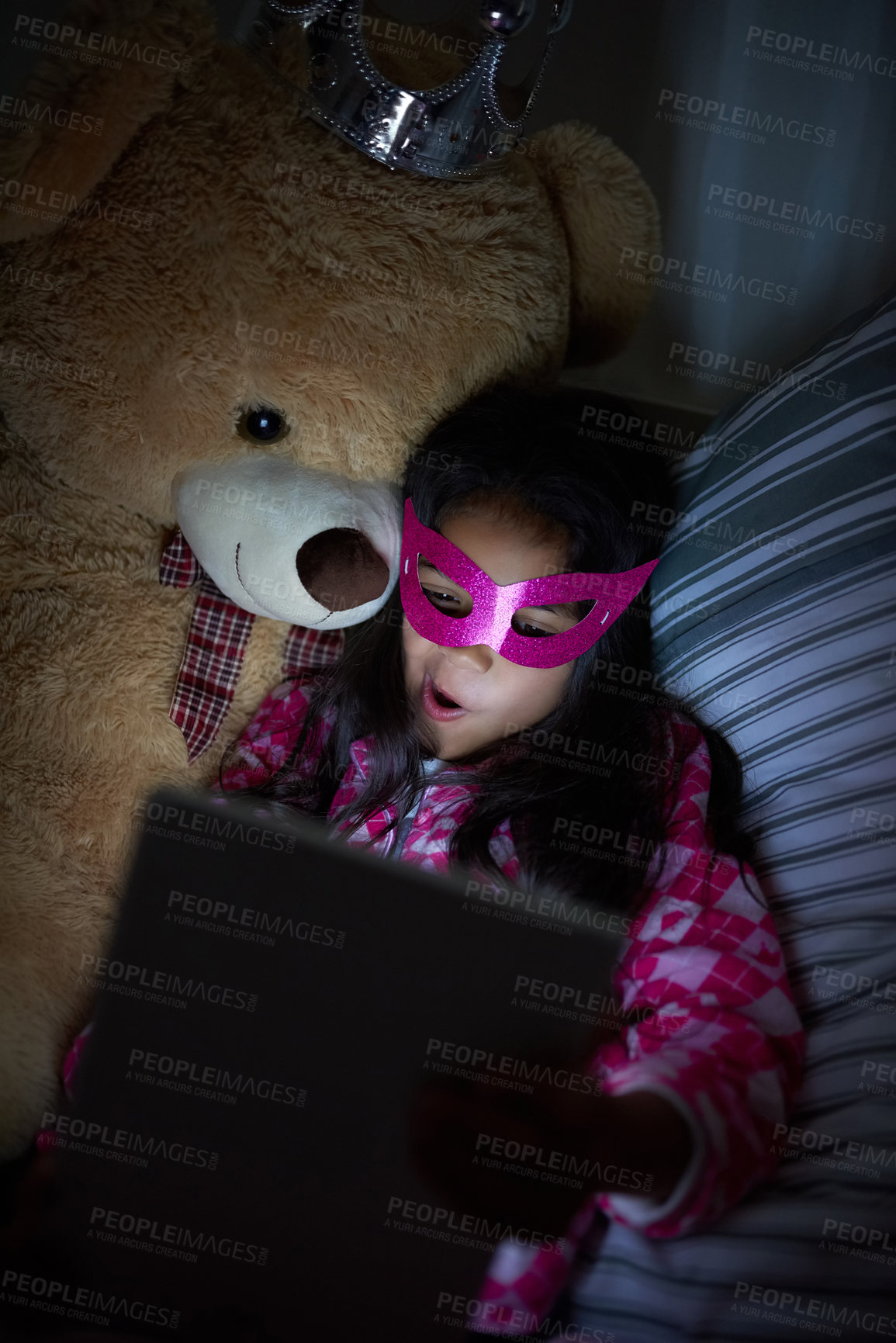 Buy stock photo Night, tablet for reading and teddy bear with girl in bedroom of home from above to relax. Mask, storytelling and technology with young child on bed in apartment for hobby, leisure or literature