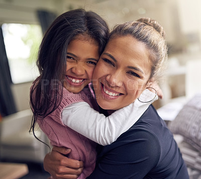 Buy stock photo Portrait of a mother and daughter bonding together at home