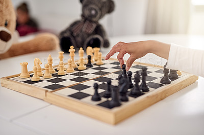 Buy stock photo Hand, chess and strategy at home with toys for practice, ideas and fantasy with bear. Young person, child and game set with pawn for learning, growth and development in problem solving in living room