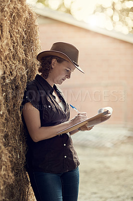 Buy stock photo Women, clipboard and writing for farming schedule, planning and review for maintenance. Female farmer, checking and notes in countryside for agriculture, sustainable job for future on planet earth