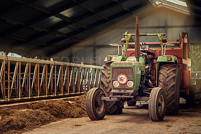 Buy stock photo Old, machine and tractor in barn on farm with dirt, rust and dust in storage warehouse on land. Vintage, retro and motor with plow truck in factory shed or tools for farming production or agriculture