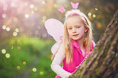 Buy stock photo Nature, child and portrait of girl in fairy park with butterfly wings for dress up, princess outfit or cosplay. Bokeh, outdoor and young kid for fantasy play, childhood or halloween costume in forest