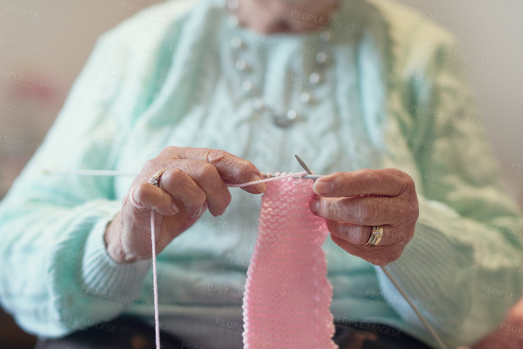 Buy stock photo Closeup shot of an unrecognisable senior woman knitting