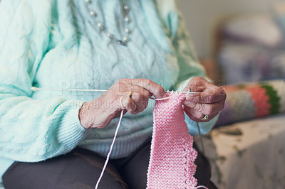Buy stock photo Closeup shot of an unrecognisable senior woman knitting