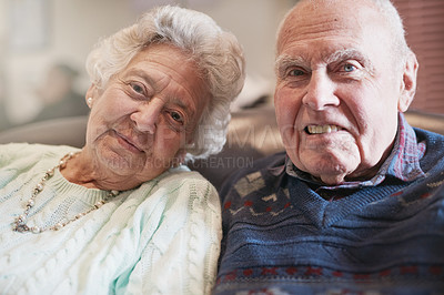 Buy stock photo Portrait of a senior couple relaxing together at home