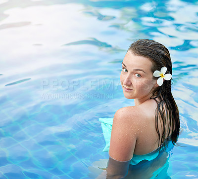 Buy stock photo Portrait of a young woman relaxing in the pool at a spa