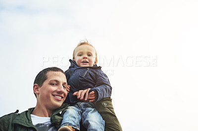 Buy stock photo Portrait of a father bonding with his son outside