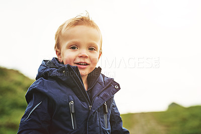 Buy stock photo Shot of a little boy playing by himself
