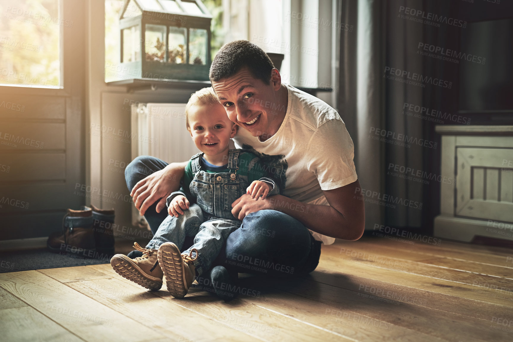 Buy stock photo Portrait of a father bonding with his son at home