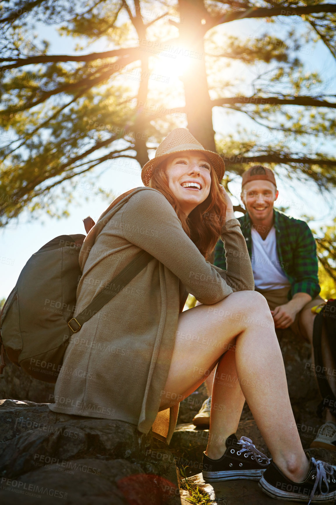 Buy stock photo Shot of two young people hiking while on an overseas trip