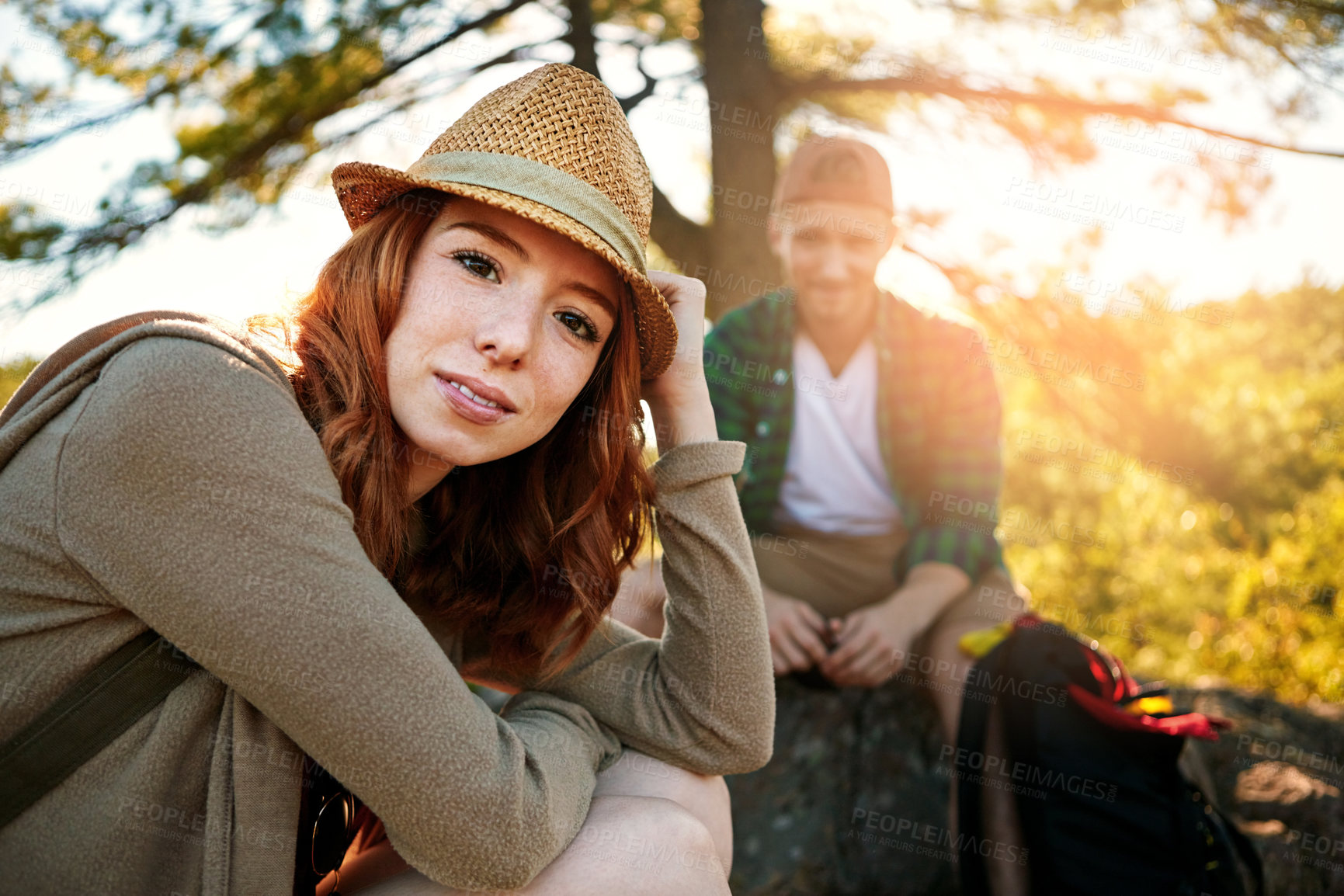 Buy stock photo Shot of two young people hiking while on an overseas trip