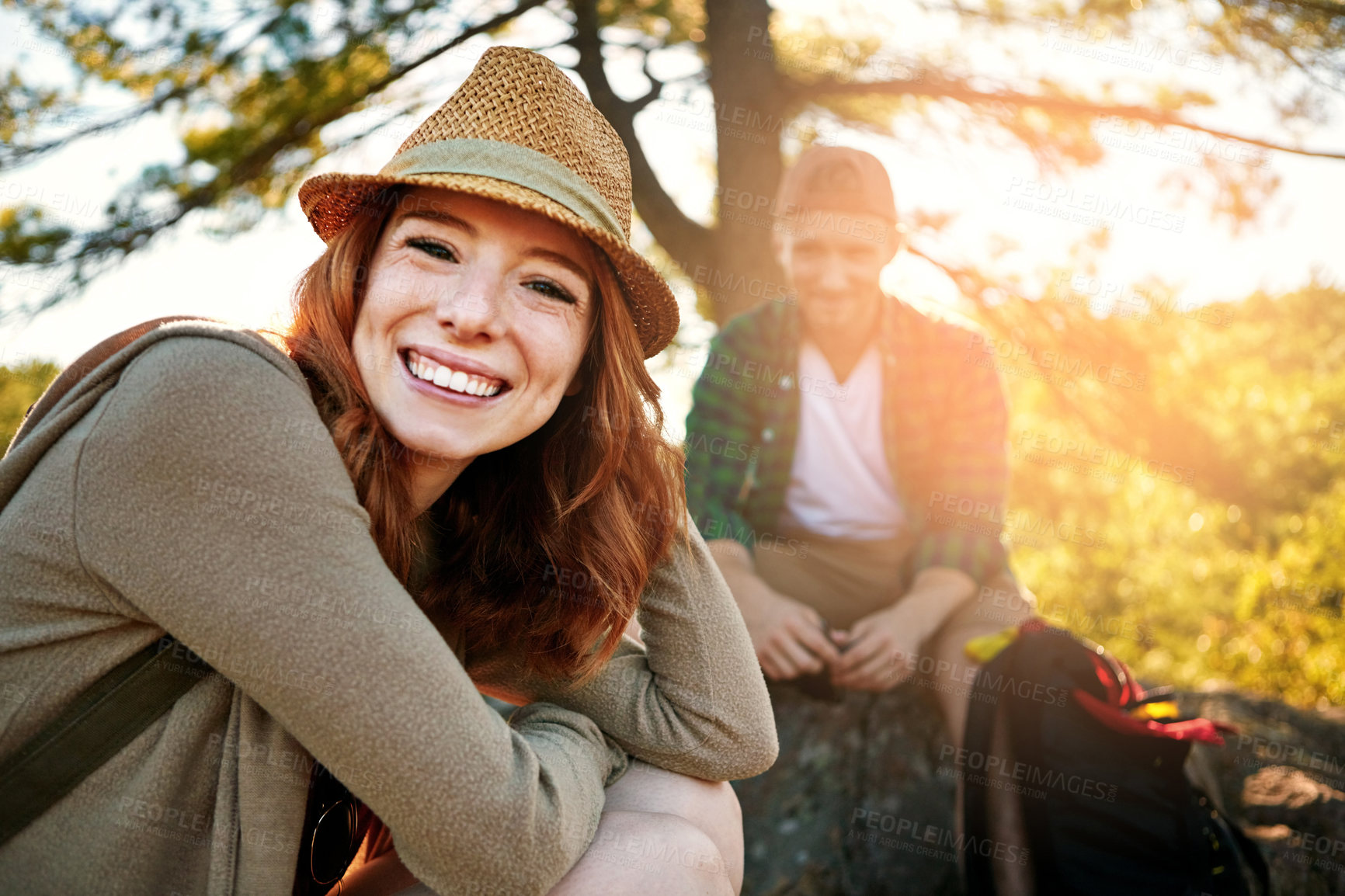 Buy stock photo Shot of two young people hiking while on an overseas trip