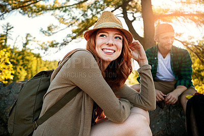 Buy stock photo Shot of two young people hiking while on an overseas trip