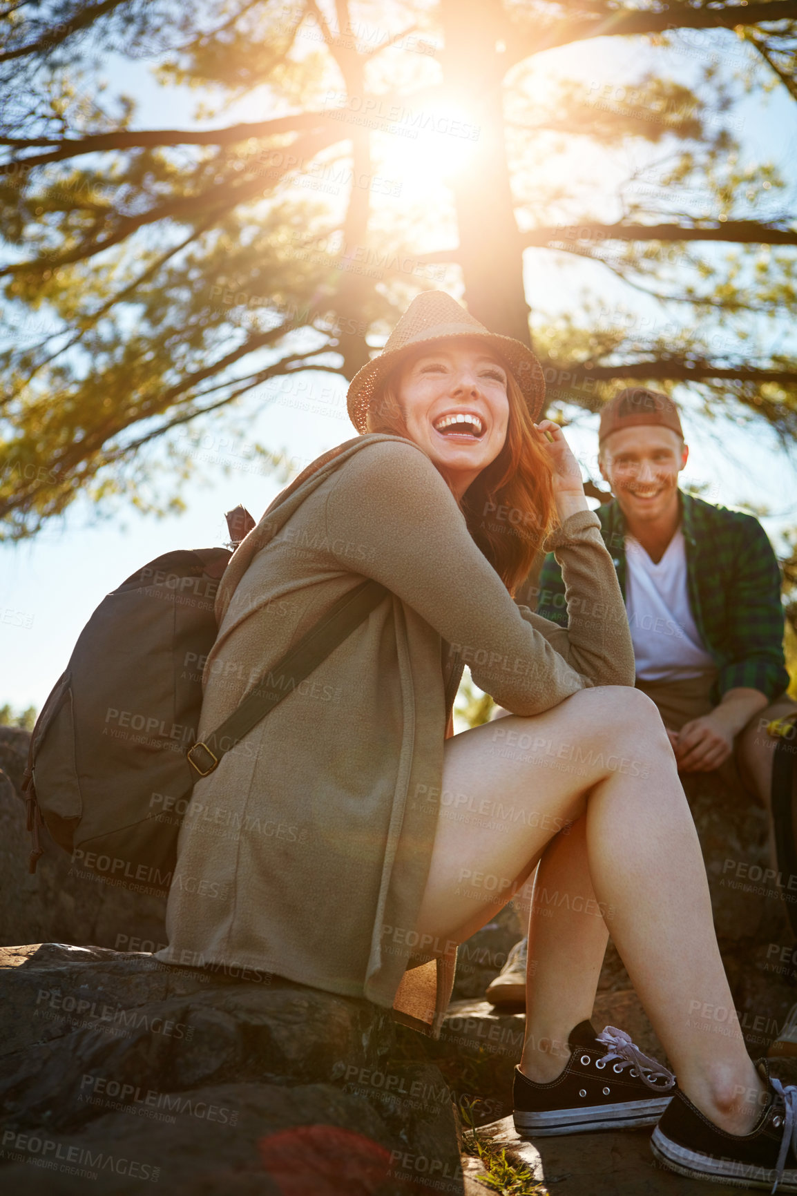 Buy stock photo Shot of two young people hiking while on an overseas trip