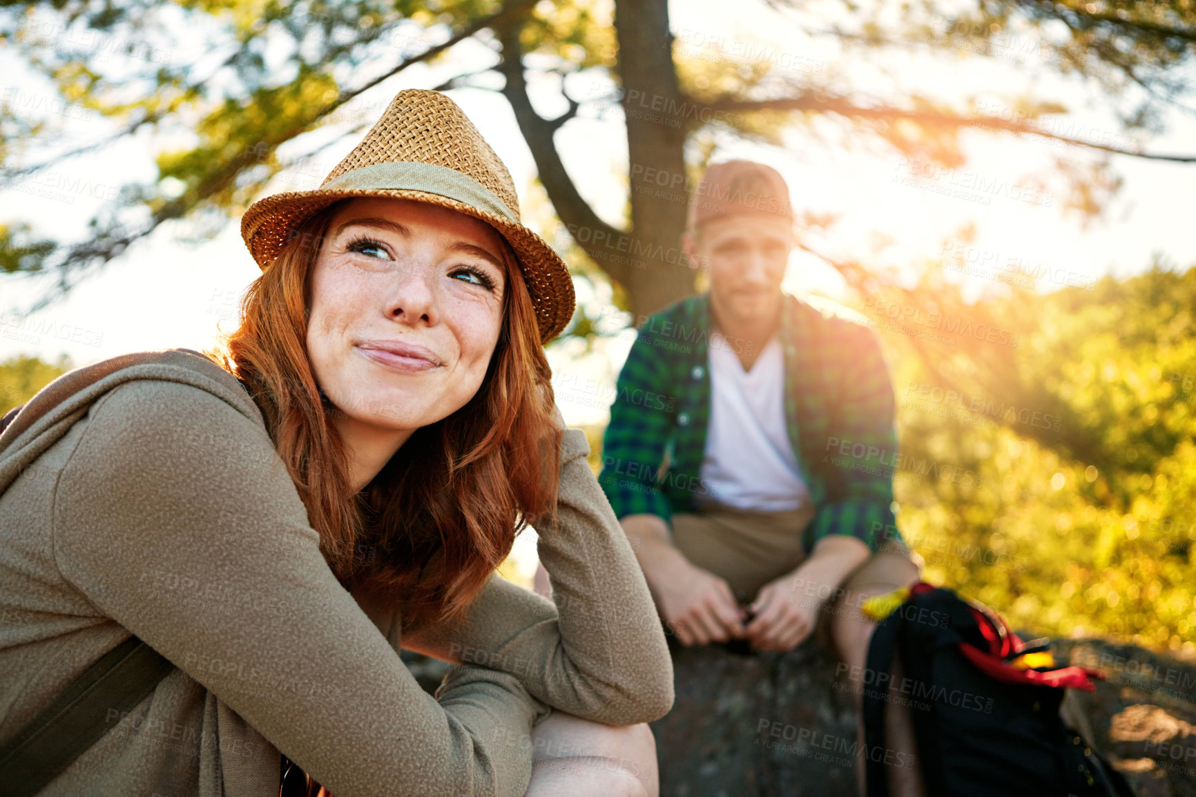 Buy stock photo Shot of two young people hiking while on an overseas trip