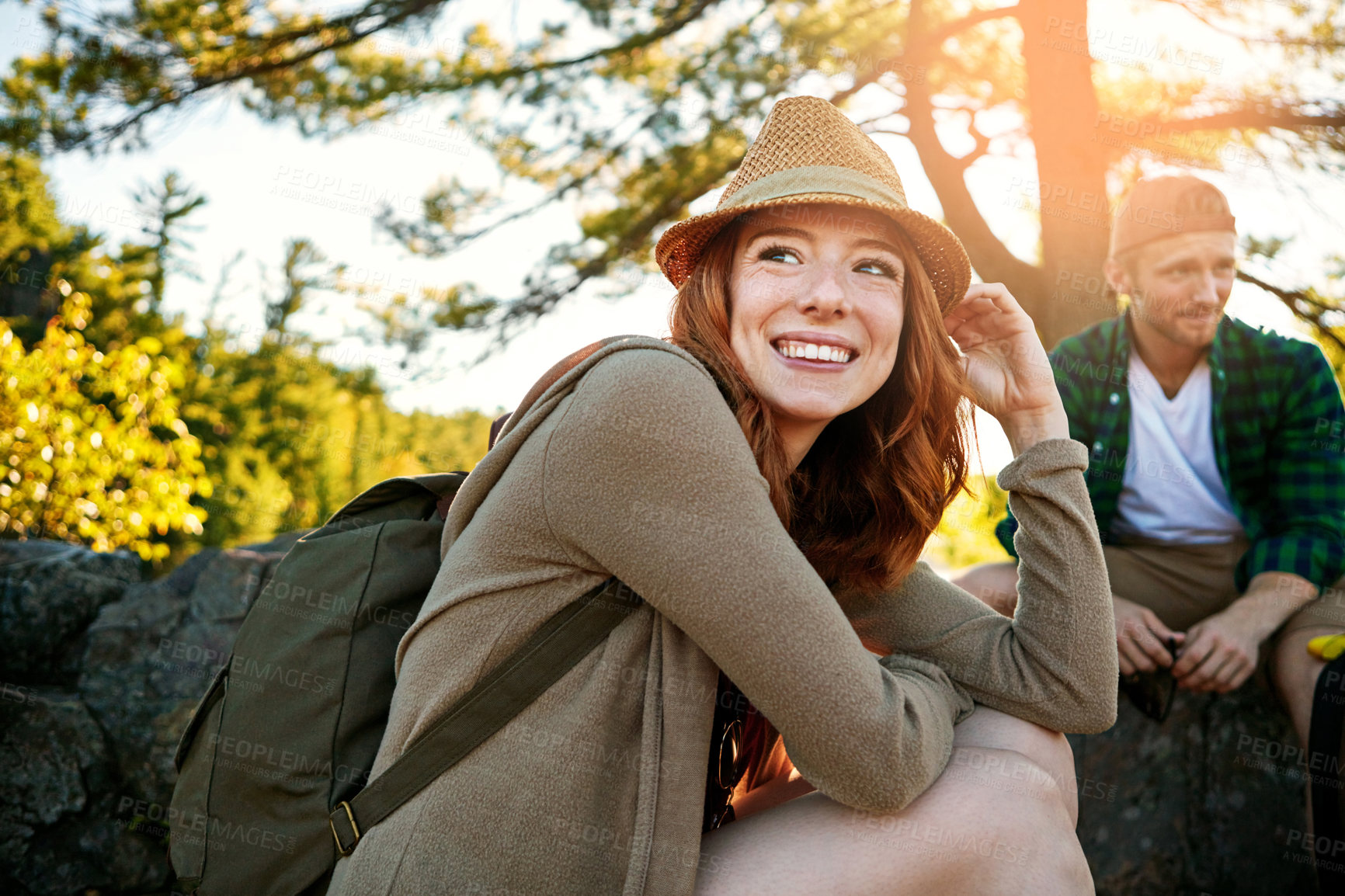 Buy stock photo Shot of two young people hiking while on an overseas trip