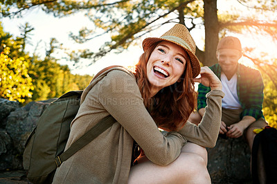 Buy stock photo Shot of two young people hiking while on an overseas trip