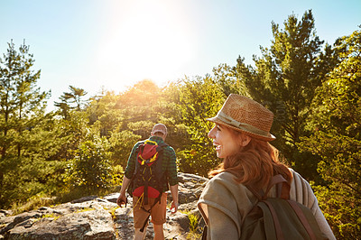 Buy stock photo Nature, hiking and couple with sunshine, blue sky and adventure holiday in mountain from back. Trekking, man and woman on travel vacation together in park with trees, bush and outdoor climbing date 