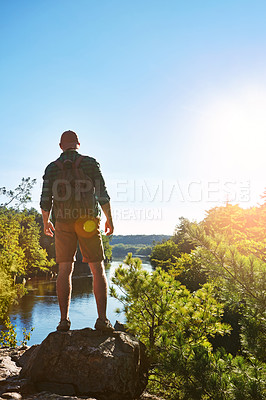 Buy stock photo Shot of a young man out hiking