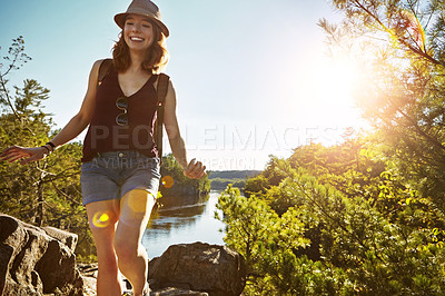 Buy stock photo Hiking, laugh and woman on mountain with lake for adventure, trekking and freedom. Travel, nature and happy person for wellness, walking and exercise on holiday, journey and vacation in morning