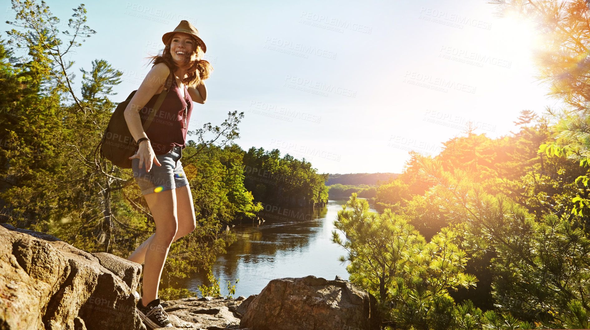 Buy stock photo Shot of a young woman out hiking