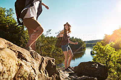 Buy stock photo Nature, hiking and couple with lake, support or adventure holiday in mountain, trees and blue sky. Trekking, man and woman on happy travel vacation together on cliff, forest or outdoor climbing park