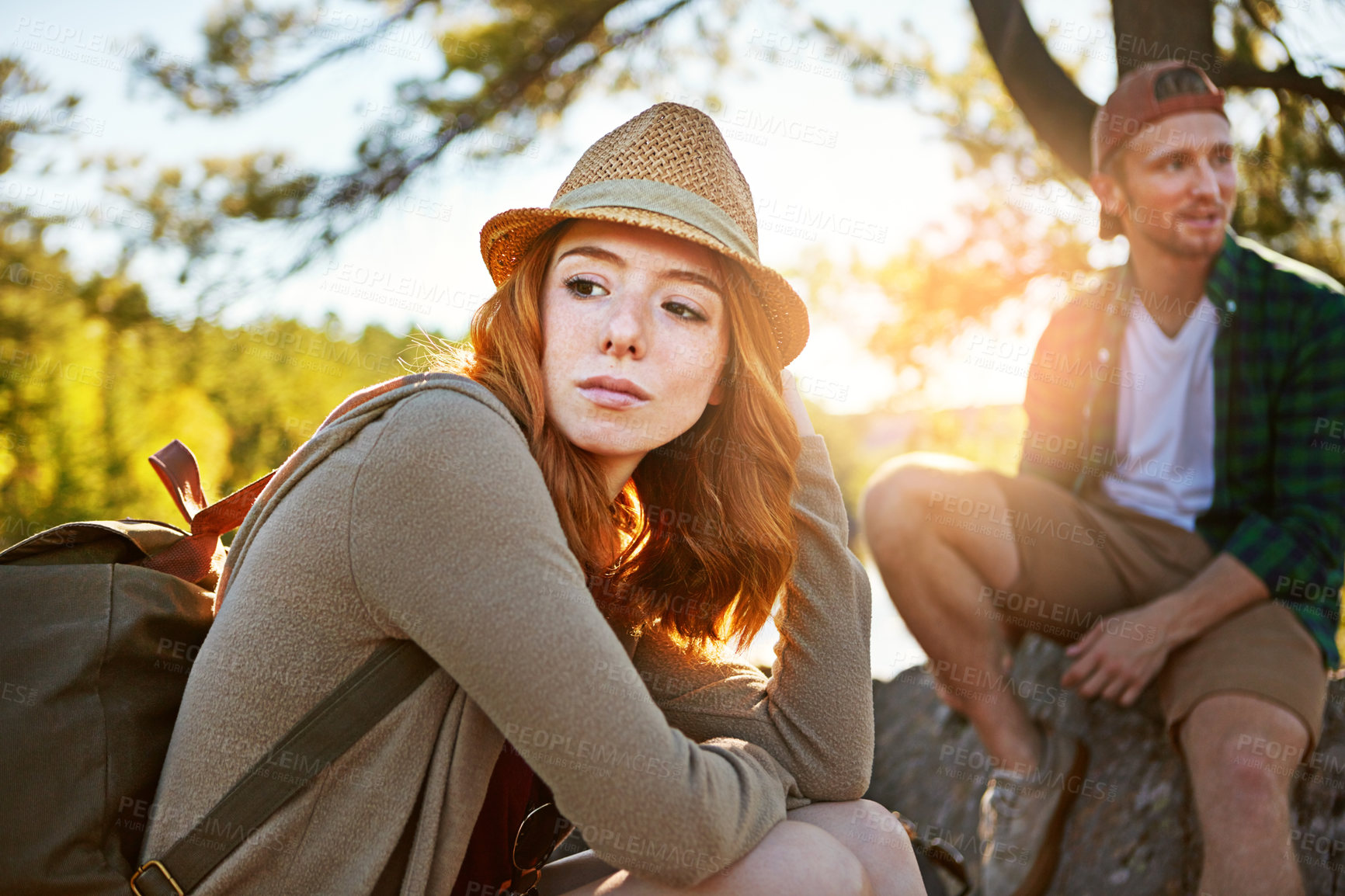 Buy stock photo Shot of two young people hiking while on an overseas trip