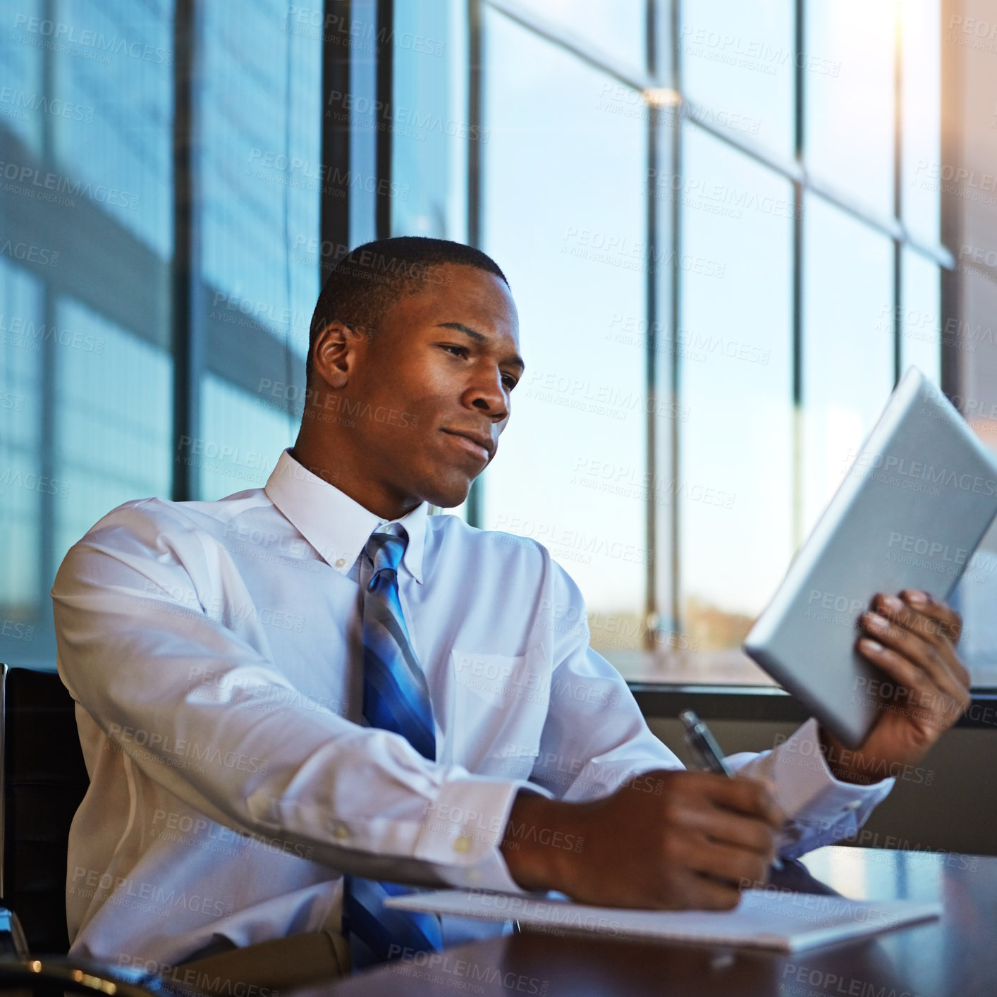 Buy stock photo Businessman, accountant and writing with tablet for finance, legal paperwork or budget planning at office. Black man, financial advisor or lawyer taking notes with technology for report at law firm