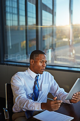 Buy stock photo Businessman, lawyer and writing with tablet for finance, legal paperwork or budget planning at office. Black man, financial advisor or accountant taking notes with technology for report at law firm