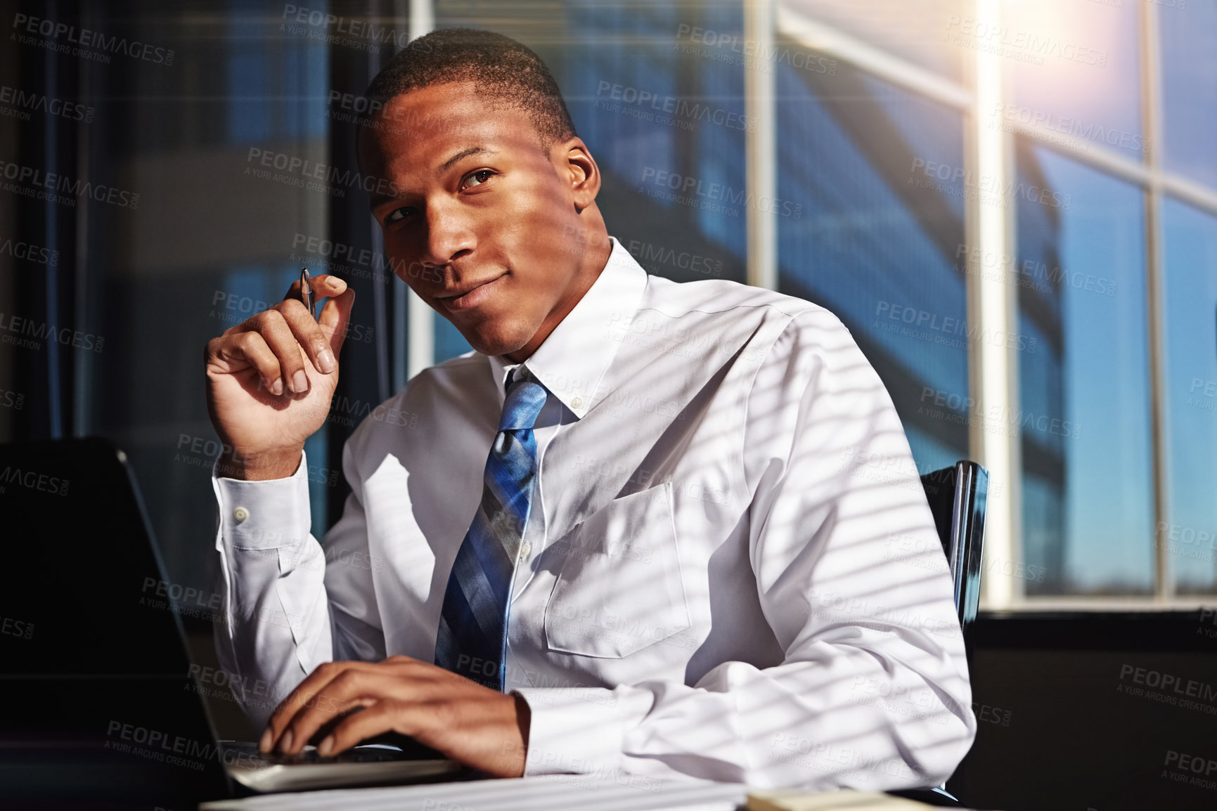 Buy stock photo Cropped shot of a businessman sitting thoughtfully in his office