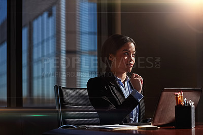 Buy stock photo Cropped shot of a businesswoman sitting thoughtfully in her office