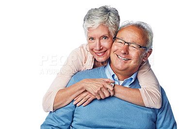 Buy stock photo Love, portrait and senior couple hug in studio, smile and happy together against a white background. Relax, face and elderly man with woman embrace, holding and enjoy retirement, bond and isolated